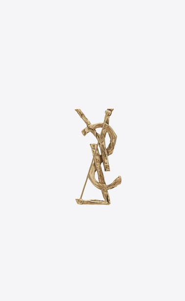 Monogram draped bow brooch in light gold metal